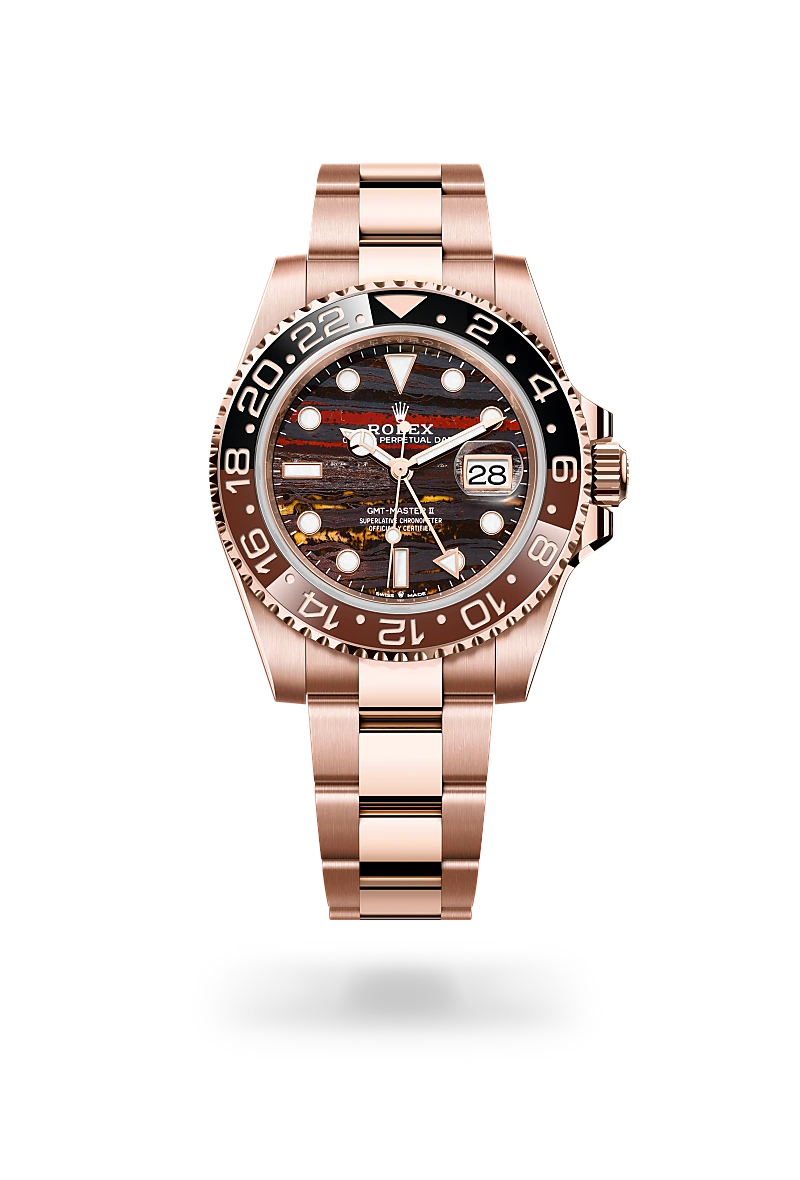 Rolex GMT-Master II in 18 ct Everose gold with a Tiger iron dial,Bidirectional rotatable 24-hour graduated bezel. Two-colour brown and black Cerachrom insert in ceramic, moulded numerals and graduations bezel and Oyster, three-piece solid links bracelet