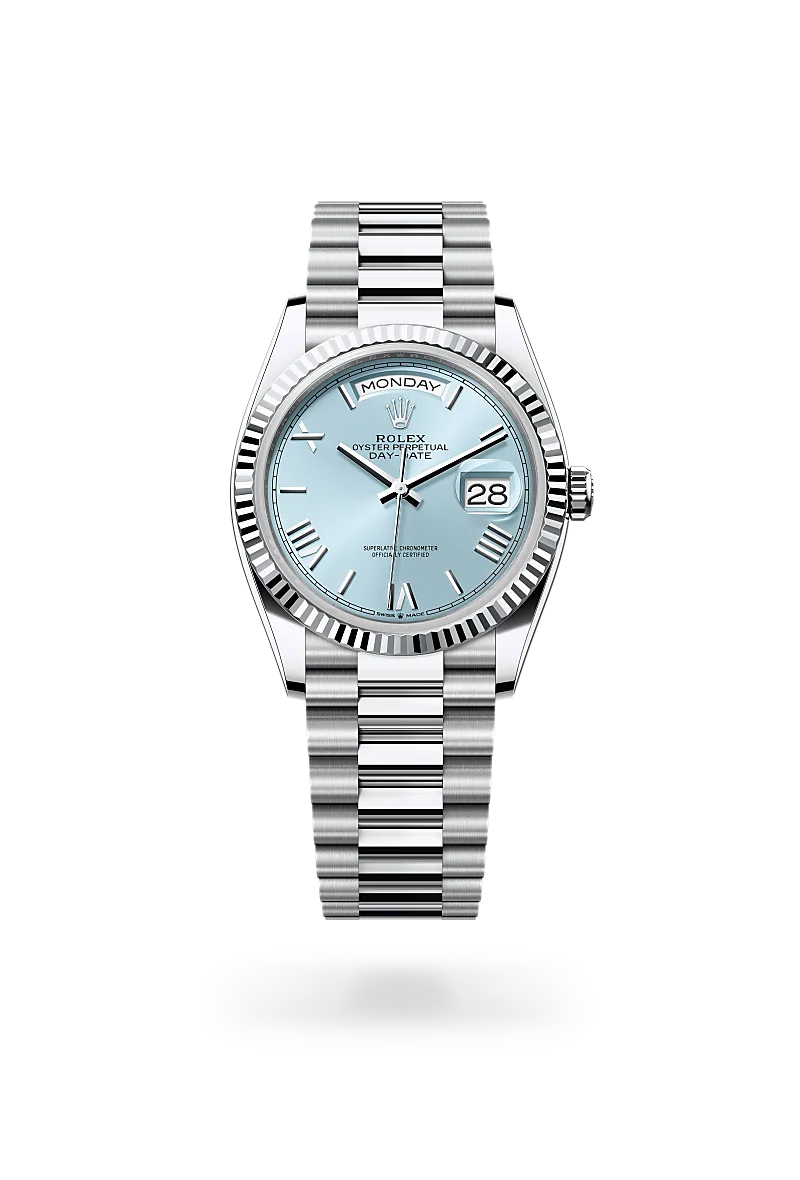 Rolex Day-Date 36 in Platinum with a Ice blue dial,Fluted bezel and President, semi-circular three-piece links bracelet